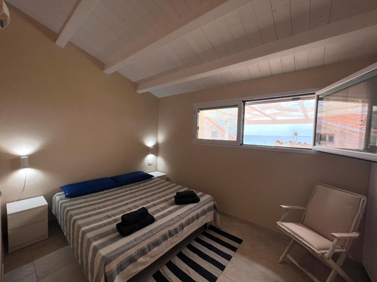 Fronte Mare S'Arena Scoada Apartment Putzu Idu Exterior photo